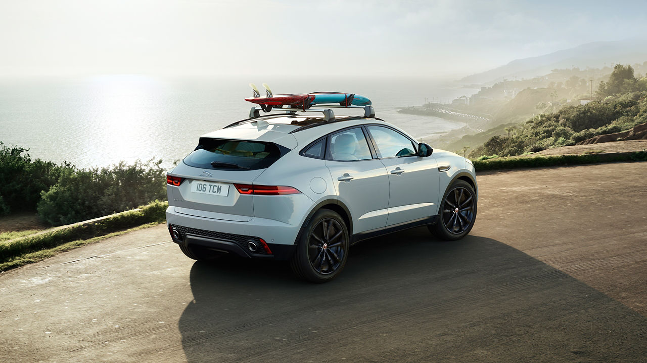 Jaguar E-Pace running on the hill road