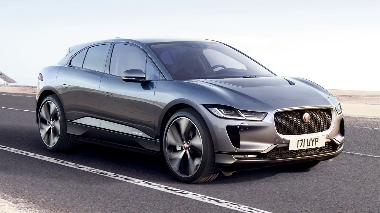 Jaguar I-PACE drifting over sand dust road